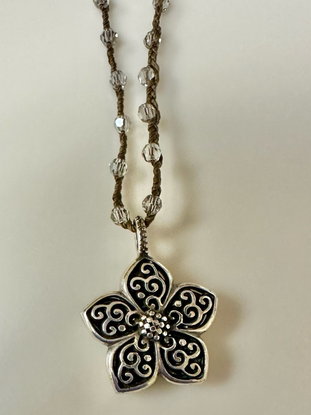 Silver Floral Pendant Necklace in Black and Brown